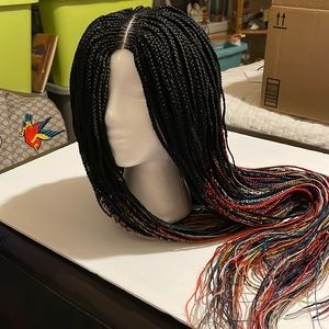 Black and multi color is handmade braid wig.